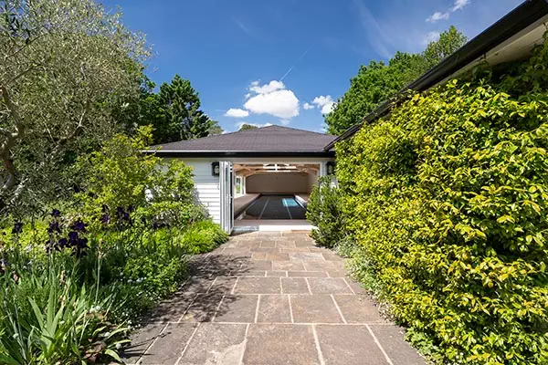 Converted outdoor pool to indoor entrance