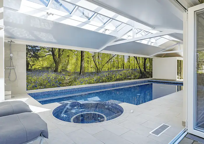 A feature wall above an indoor pool